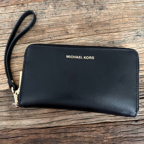 Michael Kors Handbags - Michael Kors Black Leather Wristlet with Signature Gold Accents